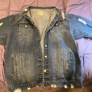 Styling, Large Jean jacket with small rips throughout